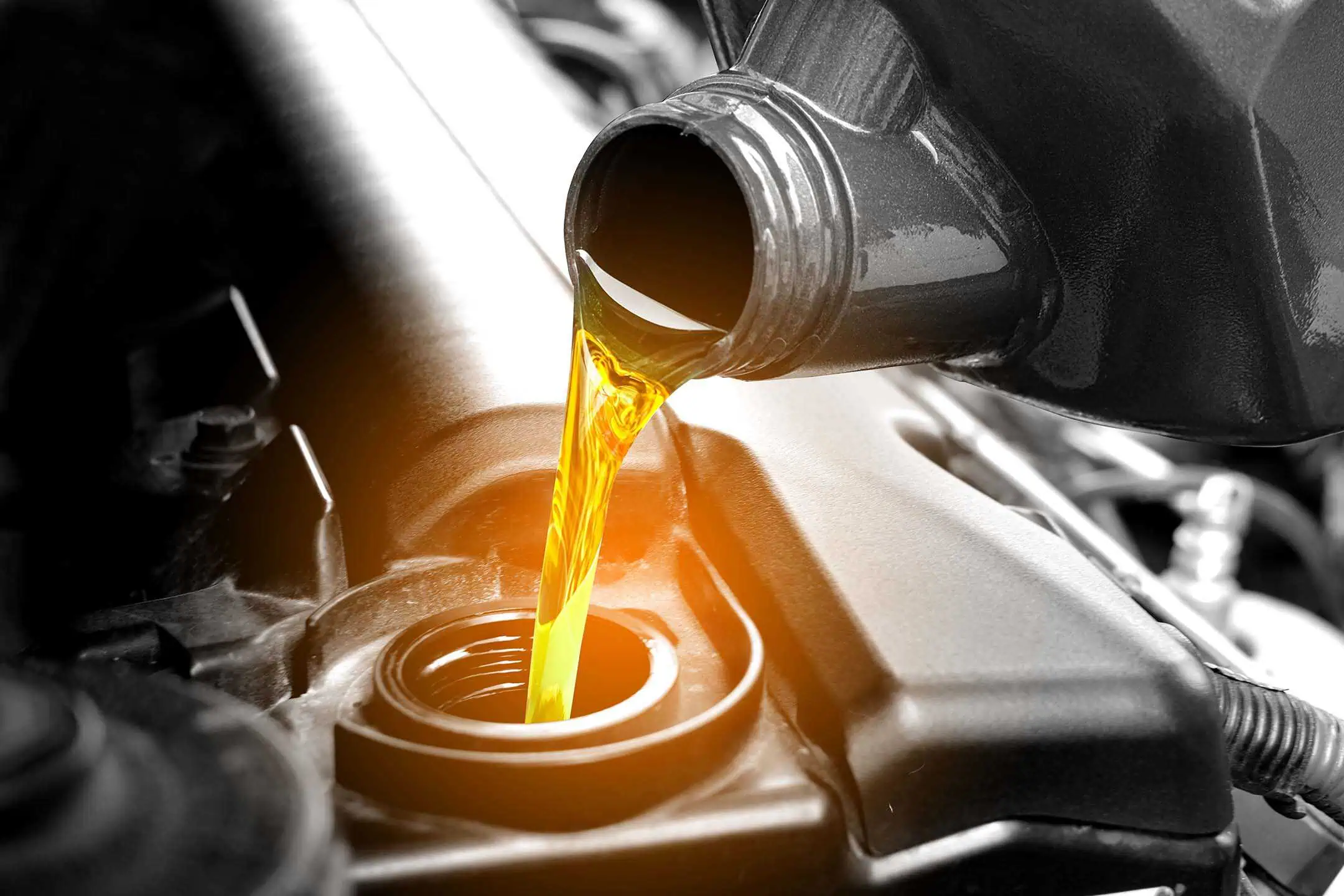 Pouring Oil Into Car