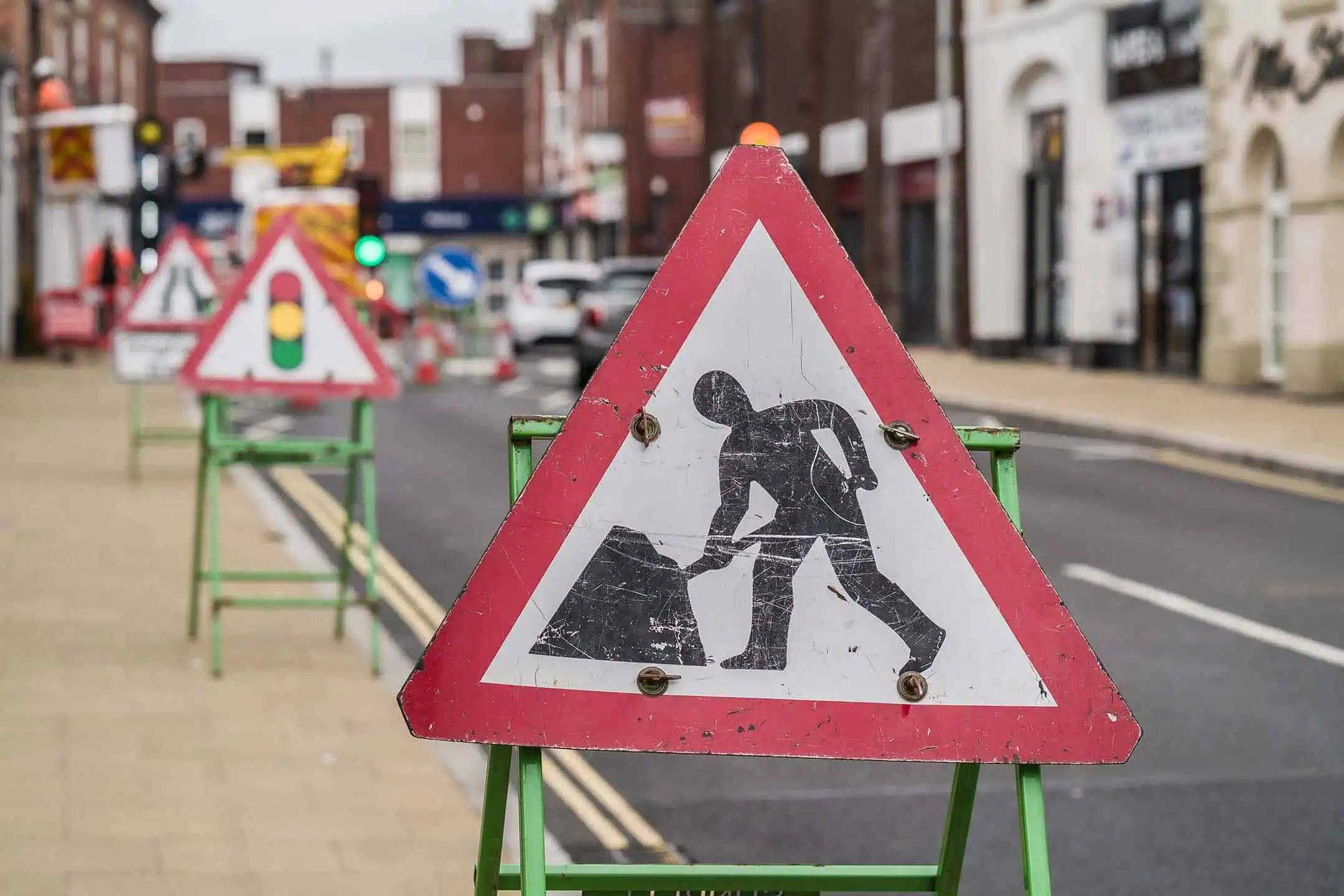 Workers In Road Sign