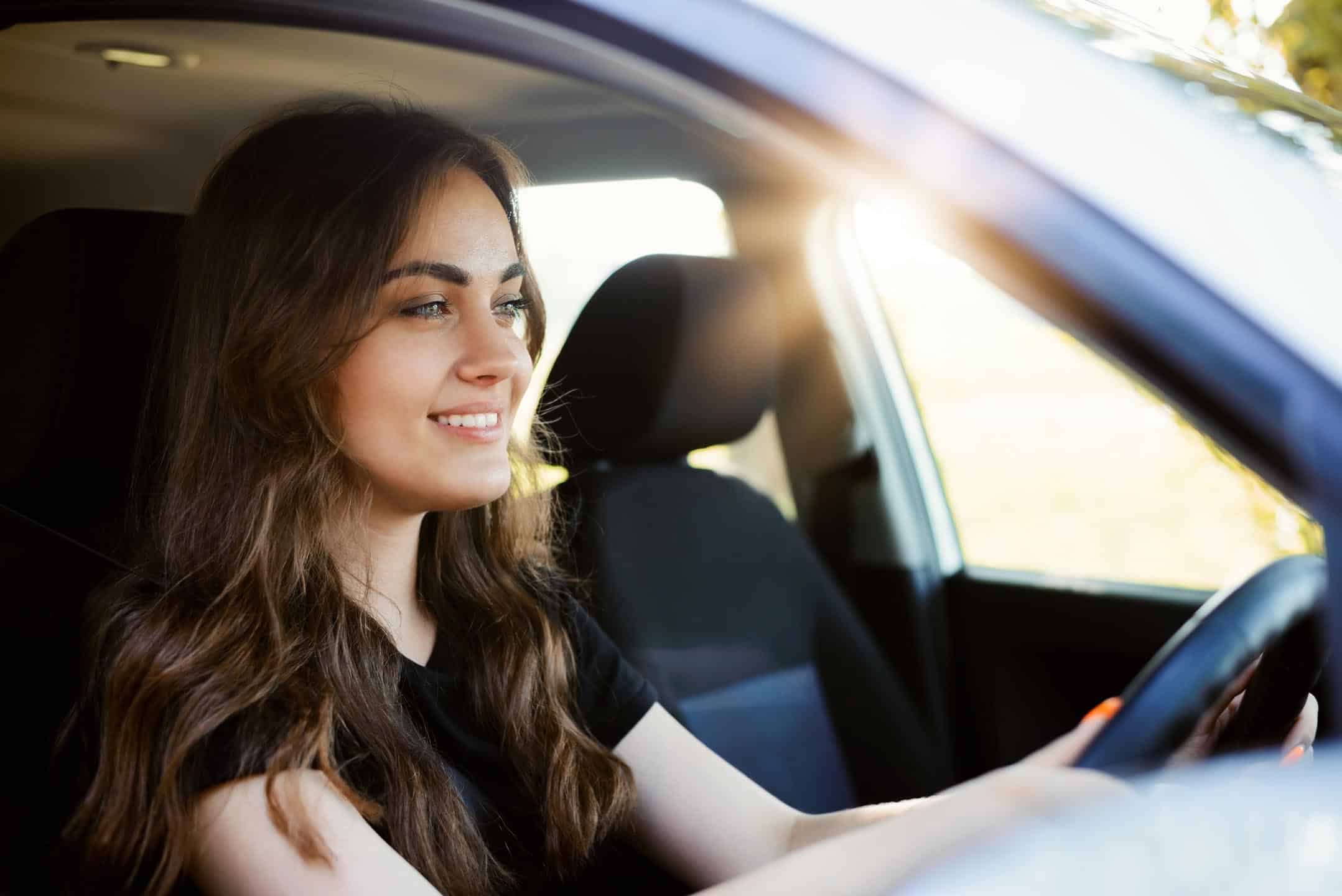 Close Up Of Woman In Driving Seat Summy Day