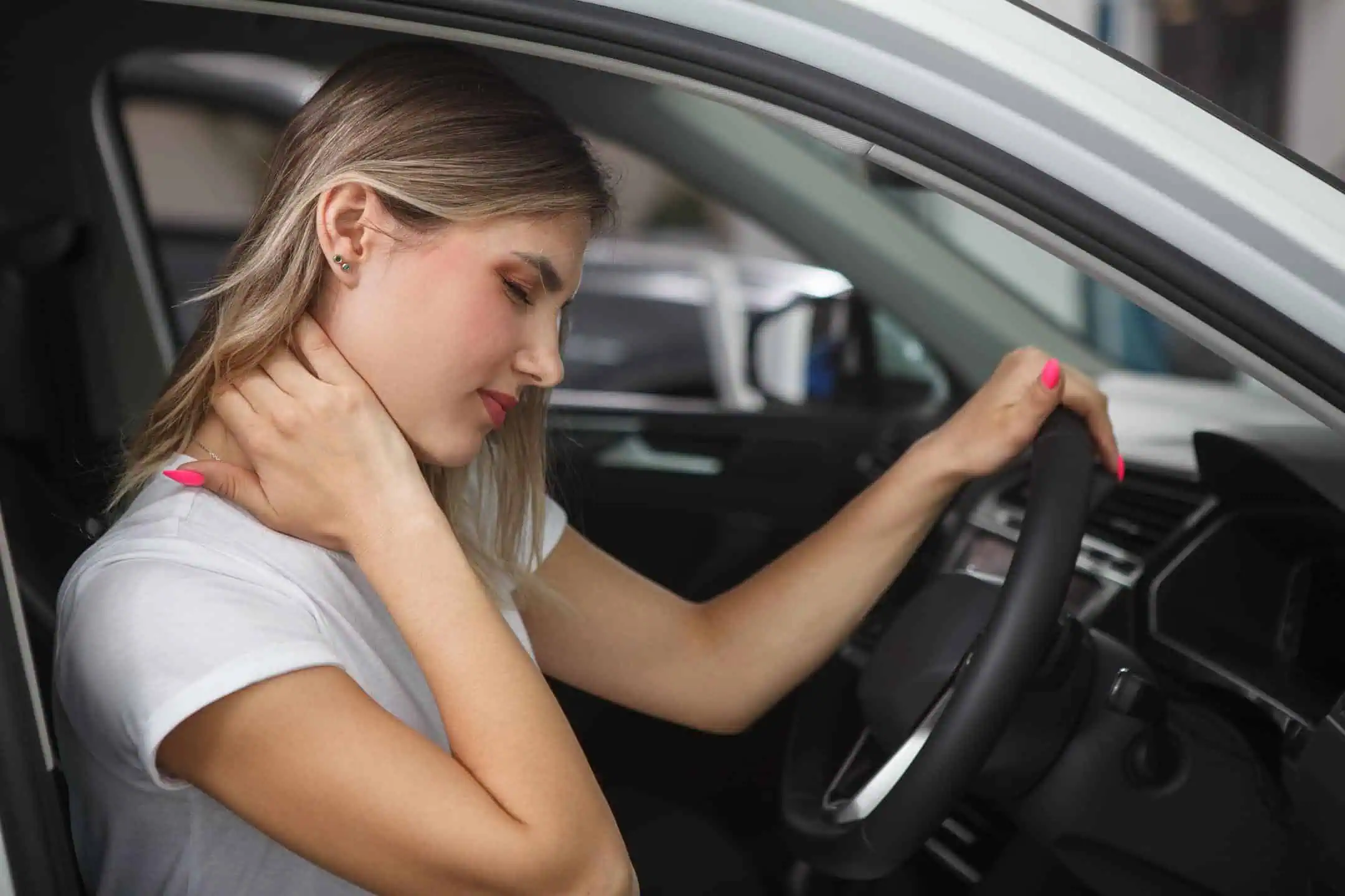 Girl In Car With Whiplash